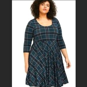 Green caged back dress